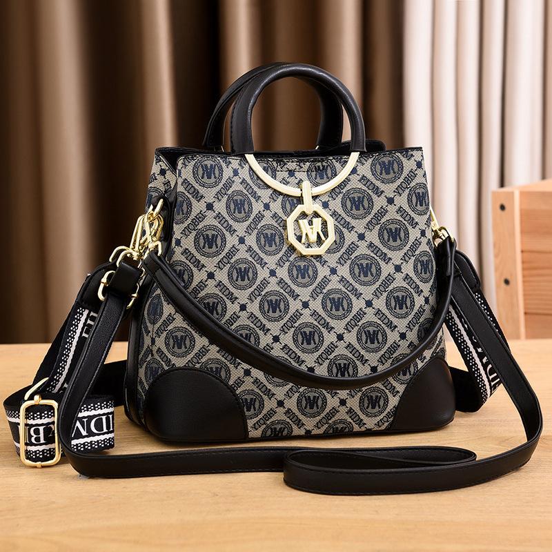 

2025 новая нишевая портативная сумка-ведро модная универсальная сумка-мессенджер из мягкой кожи