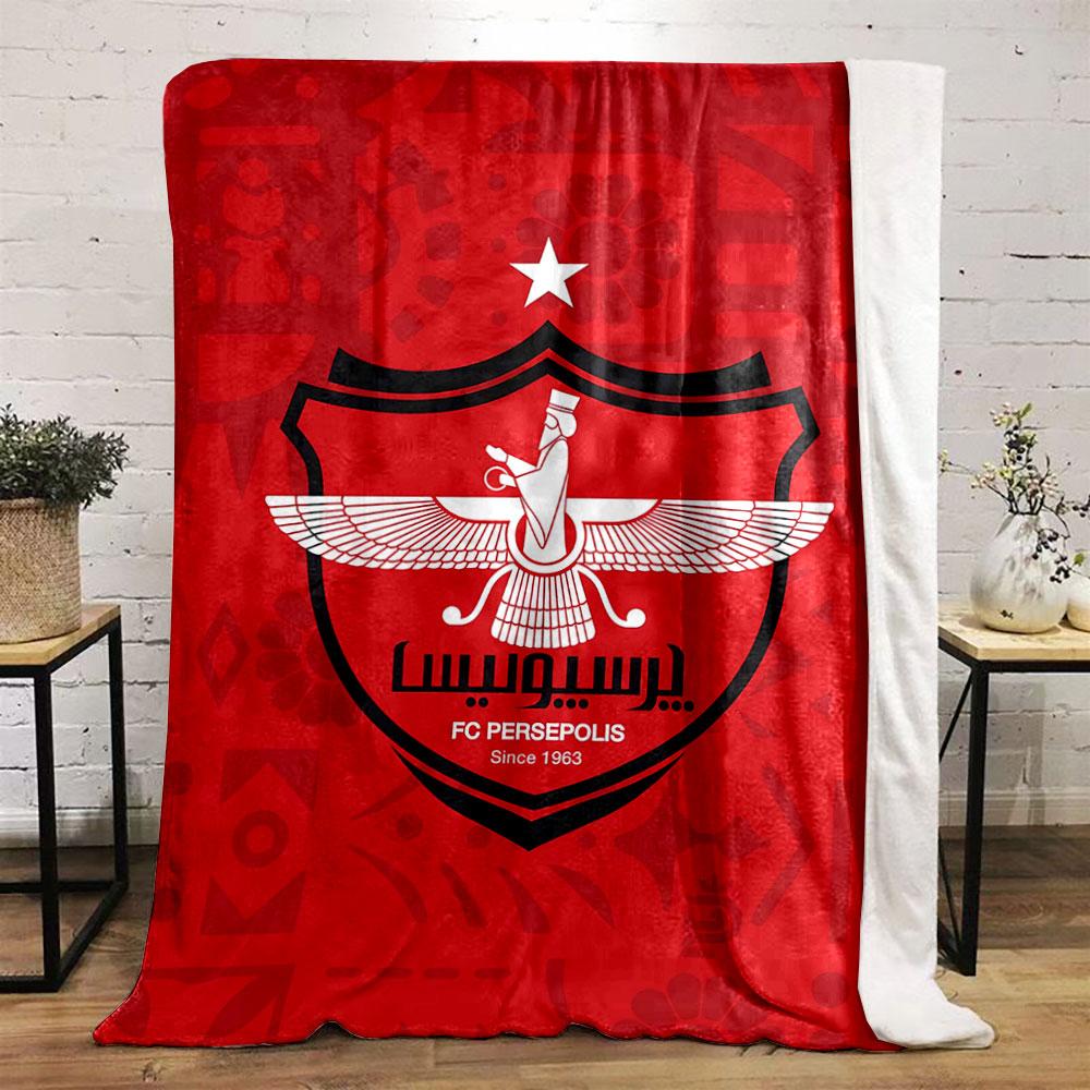 A red background with a central crest, winged figure, and a top white star. for all seasons blanket lunch break throw gift