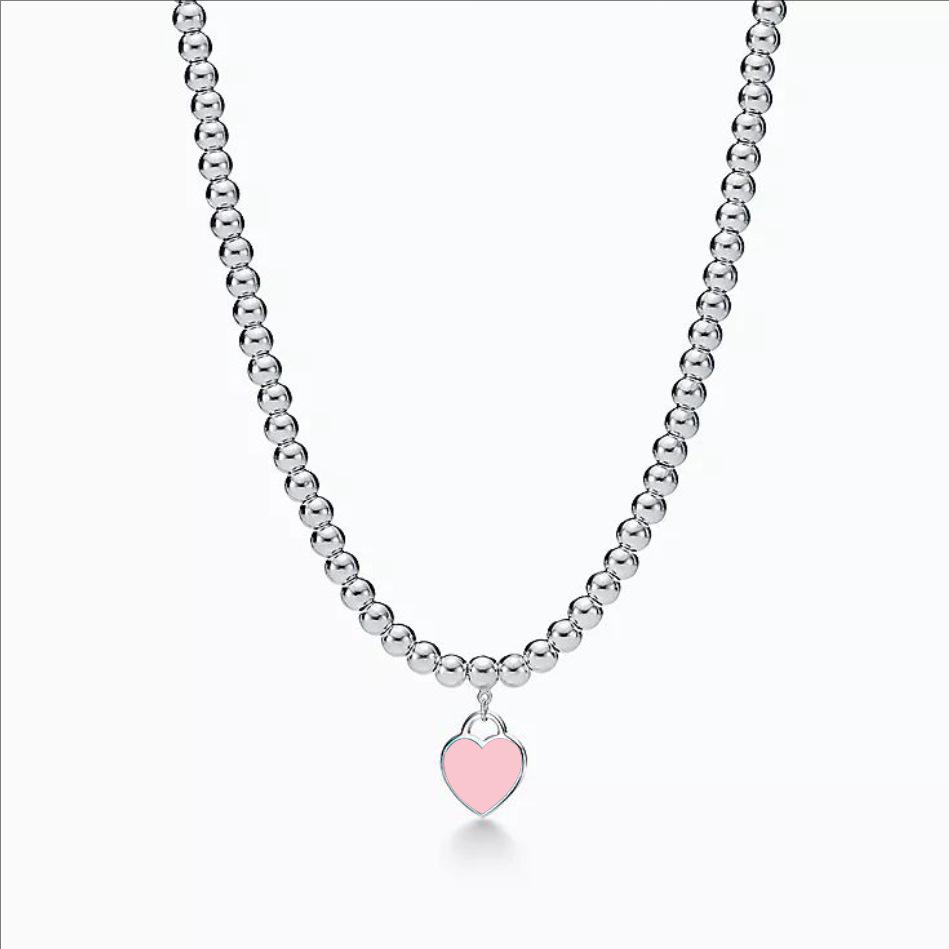 Heart-Shaped Enamel Cross Chain Necklace with Peach Heart Beads for Women - Fashionable Classic Style