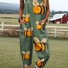 Green jumpsuit with cartoon bee pattern