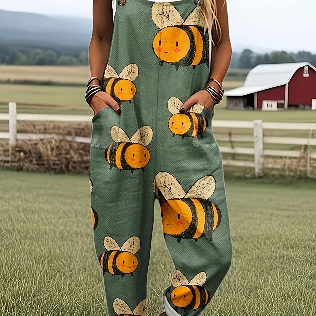 Green jumpsuit with cartoon bee pattern
