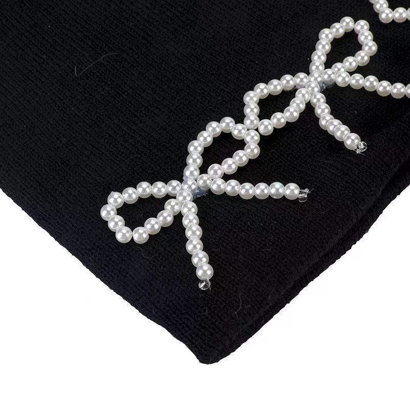 Pearl Bow Knit Hat: Trendy Korean-Style Autumn/Winter Pullover with Ear Protection.