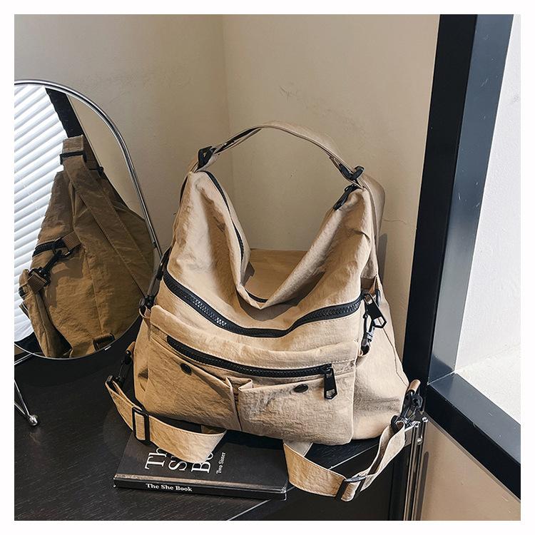 Tragetasche Damen große Kapazität 2025 neu Sommer Freizeit Nischen-Design Umhängetasche Multifunktionaler Rucksack