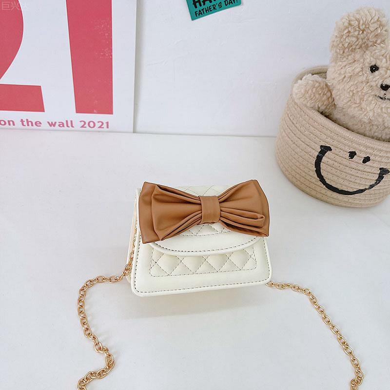 Fashionable Mini Pu Crossbody Bag For Kids With Stylish Bow And Waterproof Features