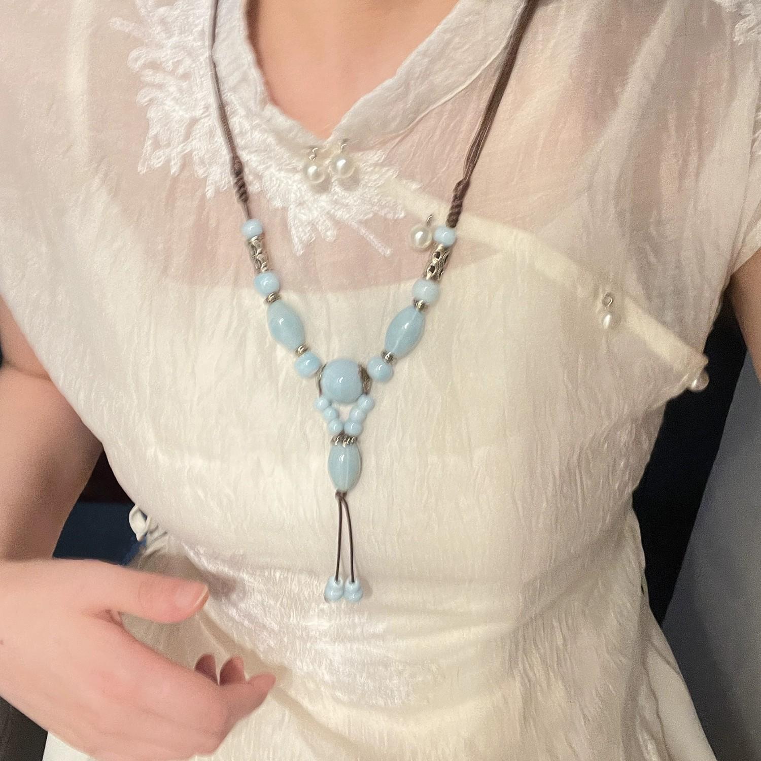 

Painted ceramic fish necklace, Bohemian style woven rope necklace, women s vintage high-end beaded clavicle chain