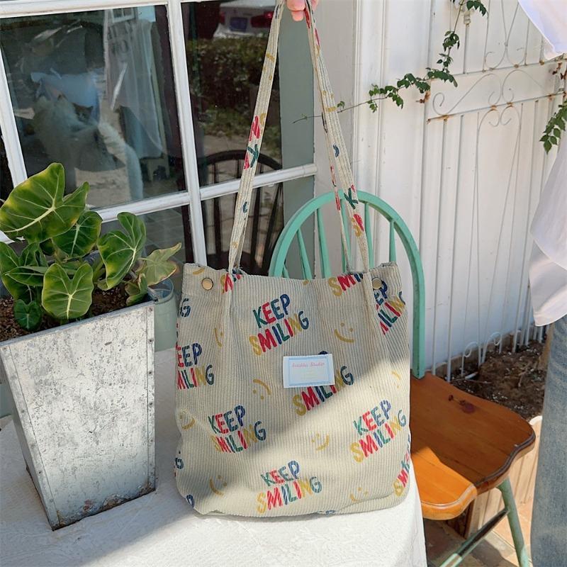 

3 large-capacity canvas bags for female students, school bags, shoulder totes, commuter bags, and portable shopping bags.