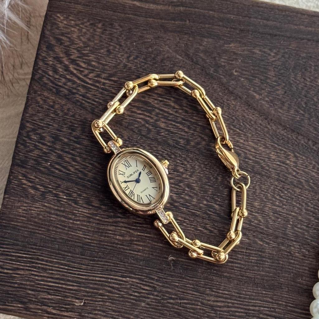 Sunlifex Women's Elegant Roman Numeral Quartz Bracelet Watch