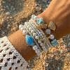 Boho-Mehrlagen-Perlenarmband-Set für Damen Sommer Ozean Strand Seestern Muschel Anhänger Elastische Armreifen Urlaubs Schmuck