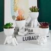 Creative Ceramic Figurine and Faux Plant Vase Set for Home Decor
