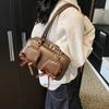 Simple retro underarm bag women's 2025 winter new niche portable commuter shoulder bag
