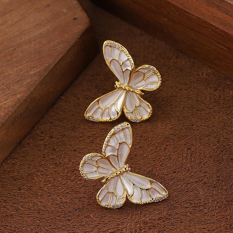 Korean Version Fashionable Simple Small Fresh White Dripping Oil Smart Butterfly Stud Earrings Light Luxury Temperament High-end Earrings