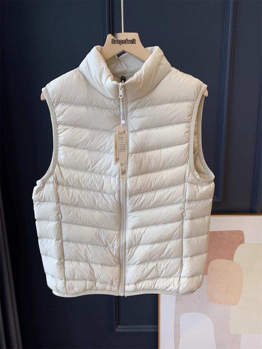 

Женский легкий жилет на утином пуху белого цвета: Короткий воротник-стойка, внутренний слой для зимы XL (60-70 kg)