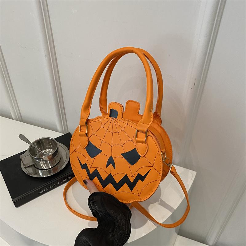 Halloween bag 2025 new contrasting color women's bag simple shoulder small round bag funny pumpkin bag women's bag