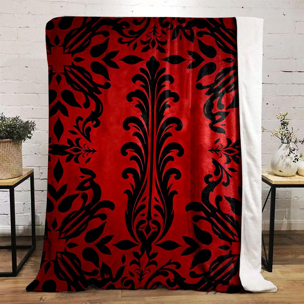 Kräftige schwarze Blumenmotive auf rotem Hintergrund mit symmetrischem Design. Decke für alle Jahreszeiten Mittagspause Überwurf Geschenk