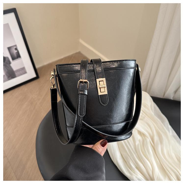 Korean temperament niche handbag 2025 spring retro simple bucket bag high-end shoulder bag messenger bag bag