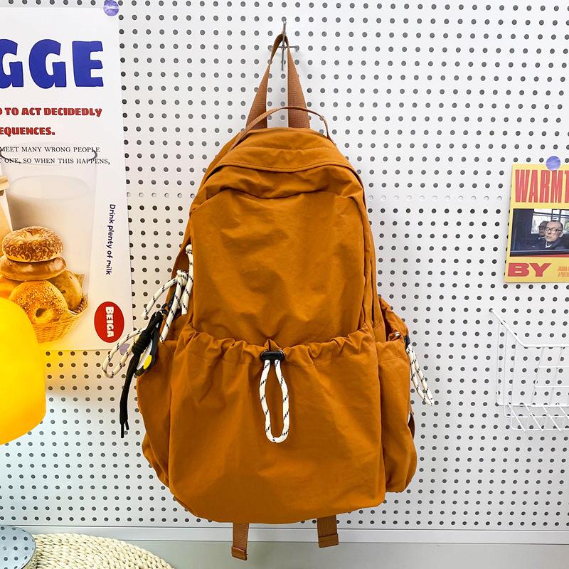 Schoolbag Solid Color Nylon Backpack Women's 1011 Summer New Large Capacity Middle and High School Student School Bag Lightweight Travel Bag