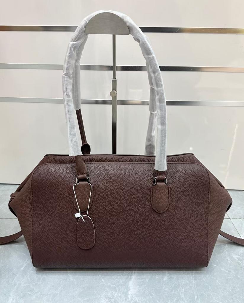 Minimalist style first-layer cowhide tote bag, high-end niche design, bowling bag, large-capacity commuting, single shoulder, armpit.