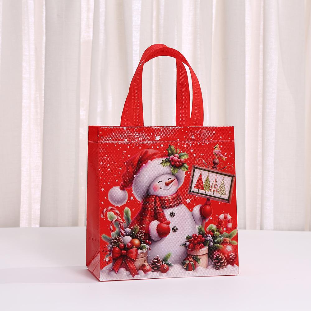 StoBag Christmas Non Woven Bags Red Santa Reindeer Gift Wrapping Bags Reusable Tote Bags for Sweets Holiday Candy Treat