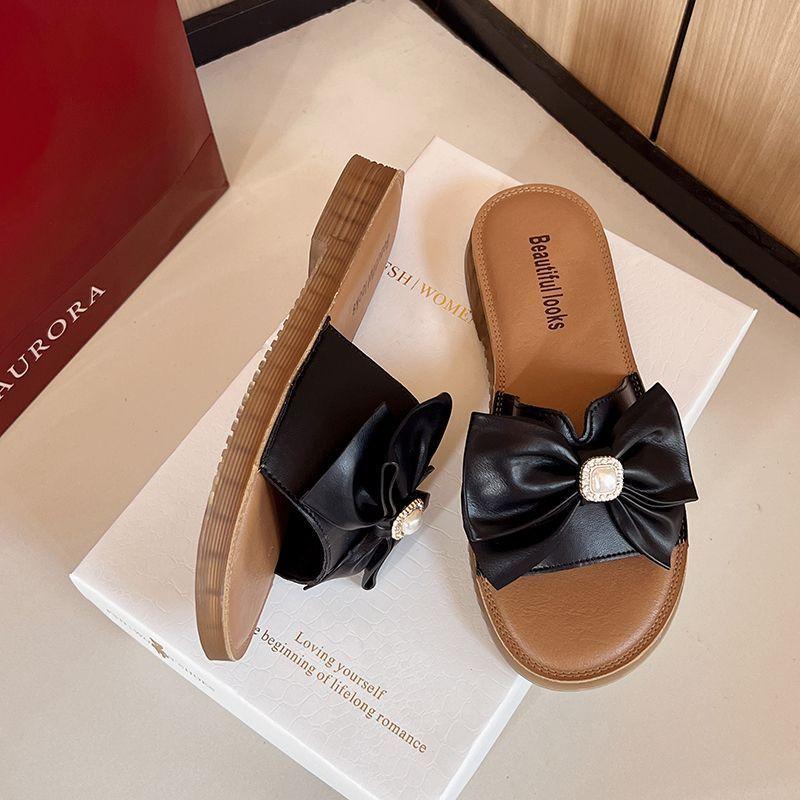 Bow women's slippers women's outer wear 2025 summer new Korean version fashion soft bottom foreign style one word cool slippers