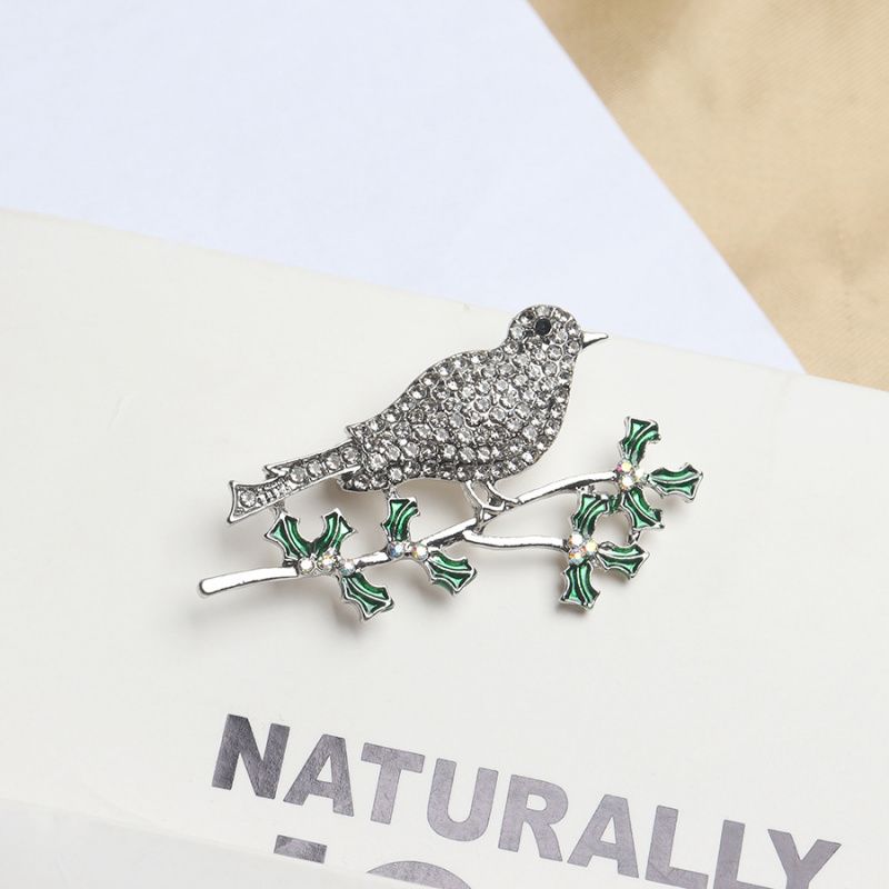 

Брошь Птица на ветке со стразами One Size серебряный