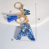 1pc Custom Blue Alphabet Letter Keychain with Butterfly Pendant Resin Ladies Key Ring with Tassel - Elegant Accessory for Bags Backpacks
