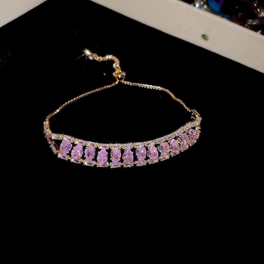 Pink Diamond Zirconia Starburst Flower Bracelet: Trendy, Luxurious Jewelry with Unique Design.