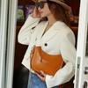 Cowhide Niche Versatile Women's Bags, Shoulder Messenger Bags, Simple Women's Bags, Zipper Dumplings, Crescent Bags.