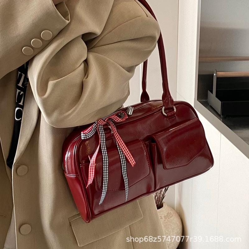 Korean Internet celebrities with the same bowling bag 2025 new niche Boston shoulder bow portable underarm women's bag