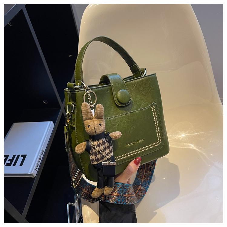 

Retro high-end bag women s high-end new Korean version fashion shoulder messenger bag niche design portable bucket bag