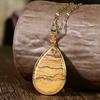 Elegant Water Drop Stone Pendant Necklace for Women, Non-Fading Gold Clavicle Accessory, Light Luxury Design.