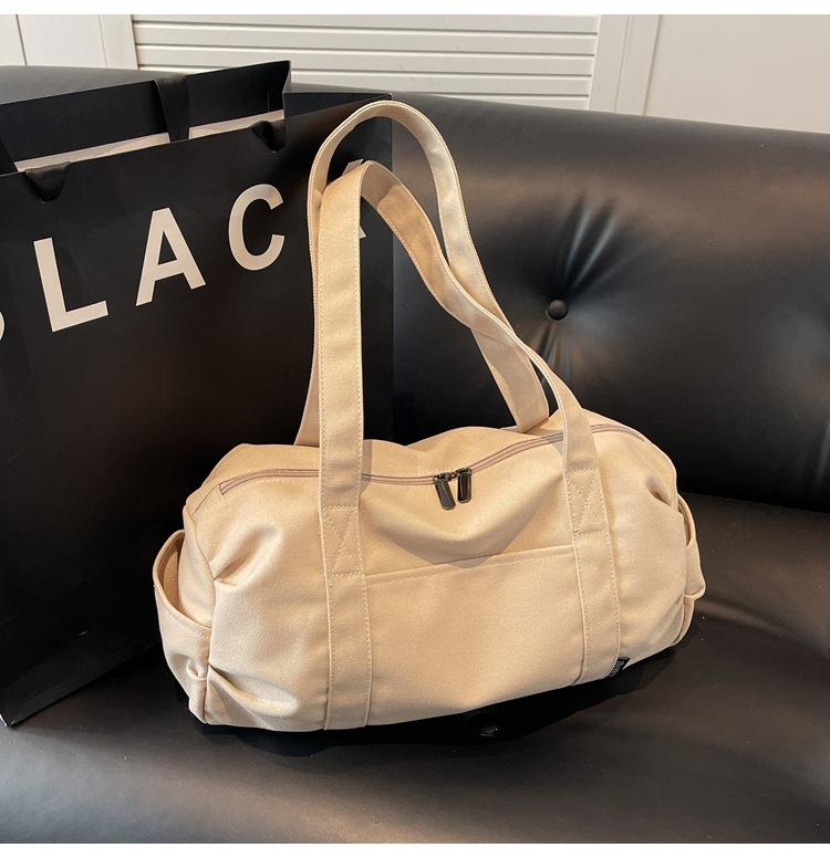 Casual canvas bag, short-distance travel bag, large-capacity sports fitness bag, versatile hand carry messenger duffel bag
