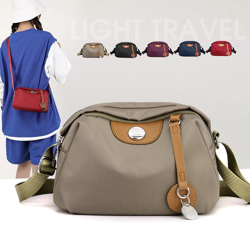Neue Damenhandtasche Nylontuch Oxford-Tuch Vielseitige Ein-Schulter-Diagonal-Umhängetasche Wasserdichtes Tuch Kontrastierende Shell-Tasche Kleine Tasche Tidal