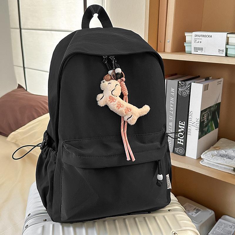 New small fresh schoolbag, high-capacity solid-color backpack for junior high school girls, high-value backpack for primary school students