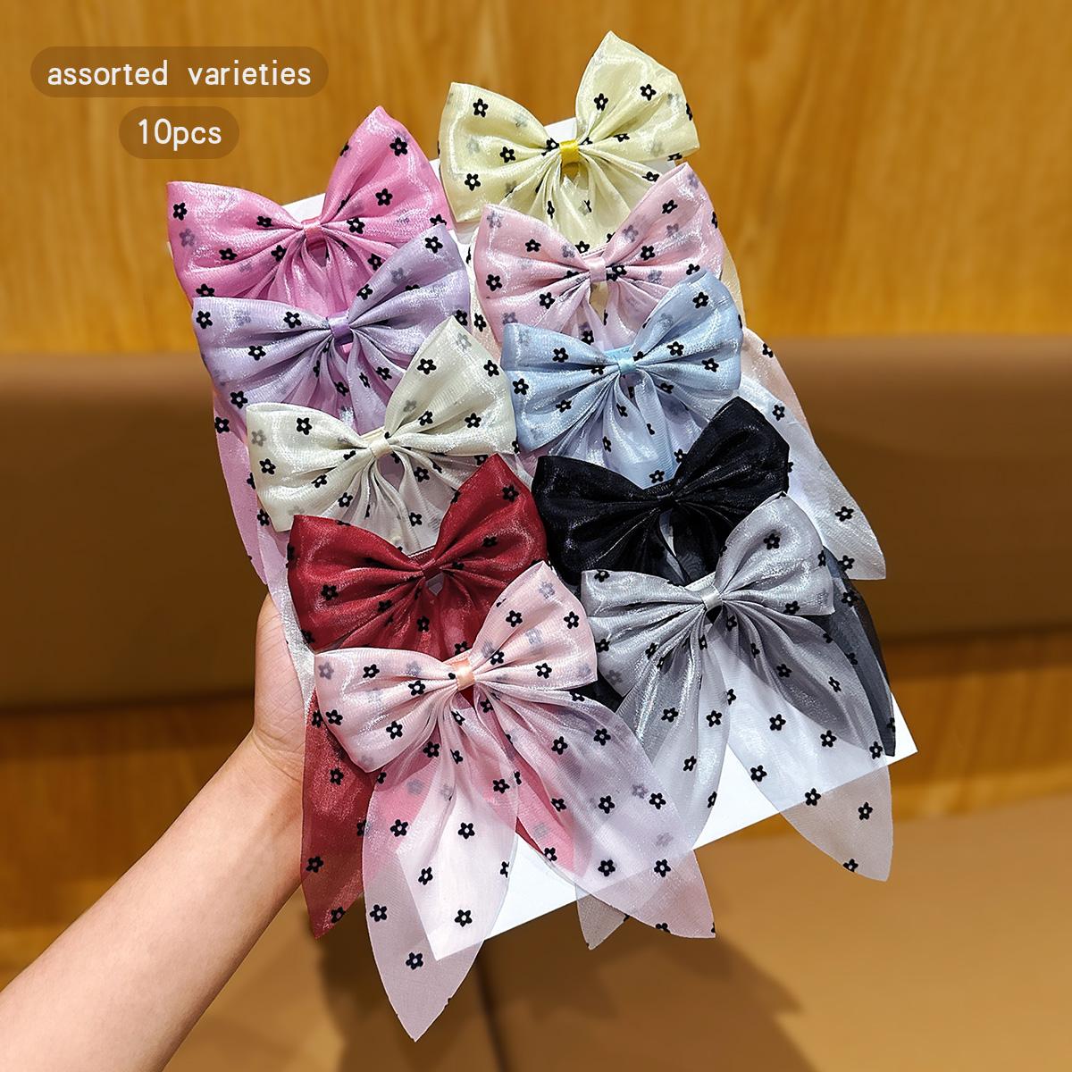 

10 colors of random sweet floral bow hair clip Size fits all