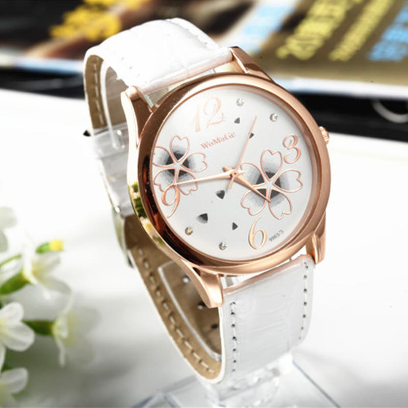 Damen Blumendekoration Quarz Schmetterling Haut Damenuhr Casual Modeuhr Dornschließe