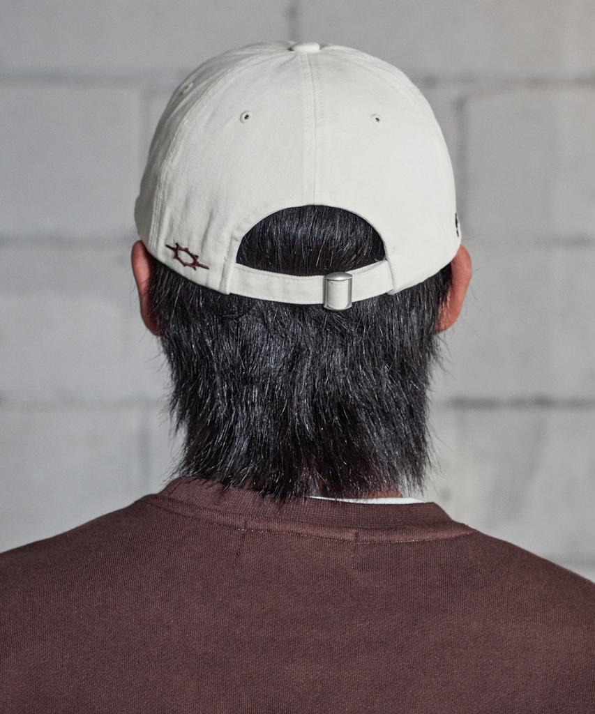 Lujeoseukeulleob Washed Star Logo Cap Cream