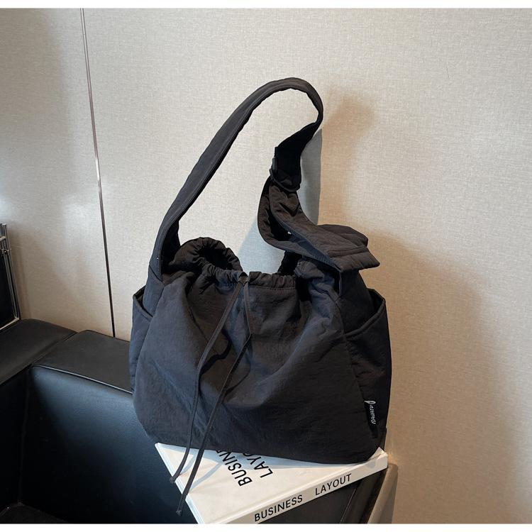 

Spring new bag women s shoulder bag messenger bag women s casual simple canvas bag large capacity чорний