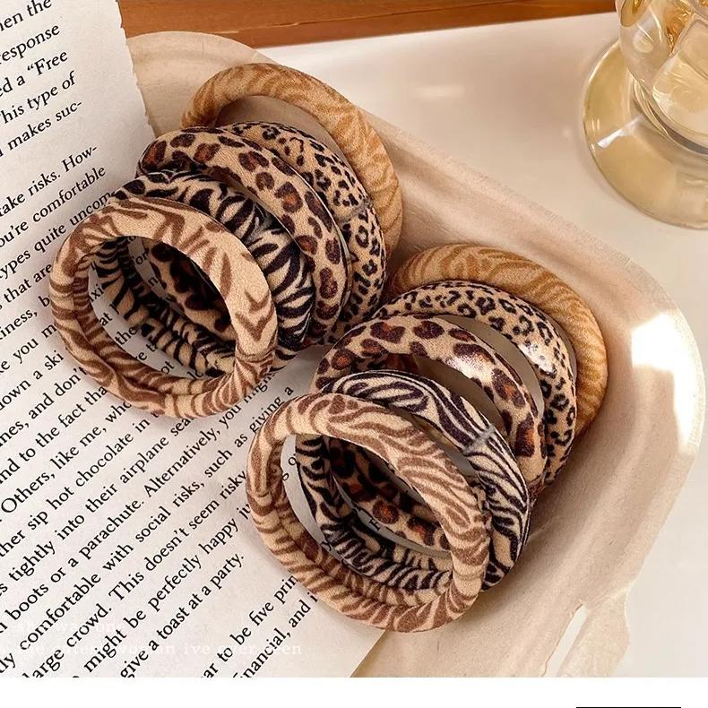 10 Stück/Los Leopardenmuster Hochelastische Haargummis Scrunchie-Gummis Damen Hochelastizität Pferdeschwanzhalter Haarringe Seil-Accessoires