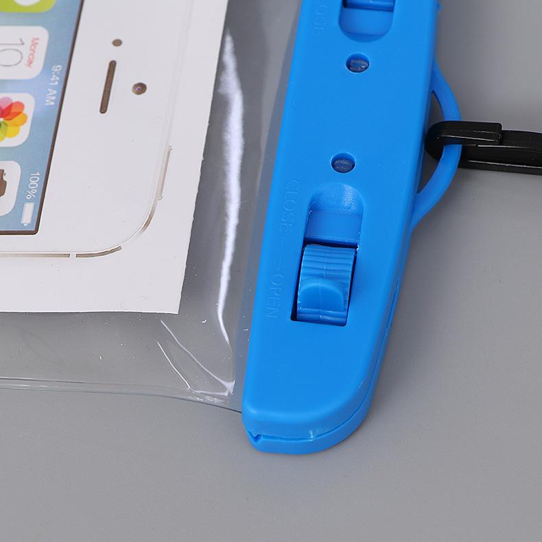 Transparent waterproof phone bag with classic style, touch screen access, neck strap for hot spring use.