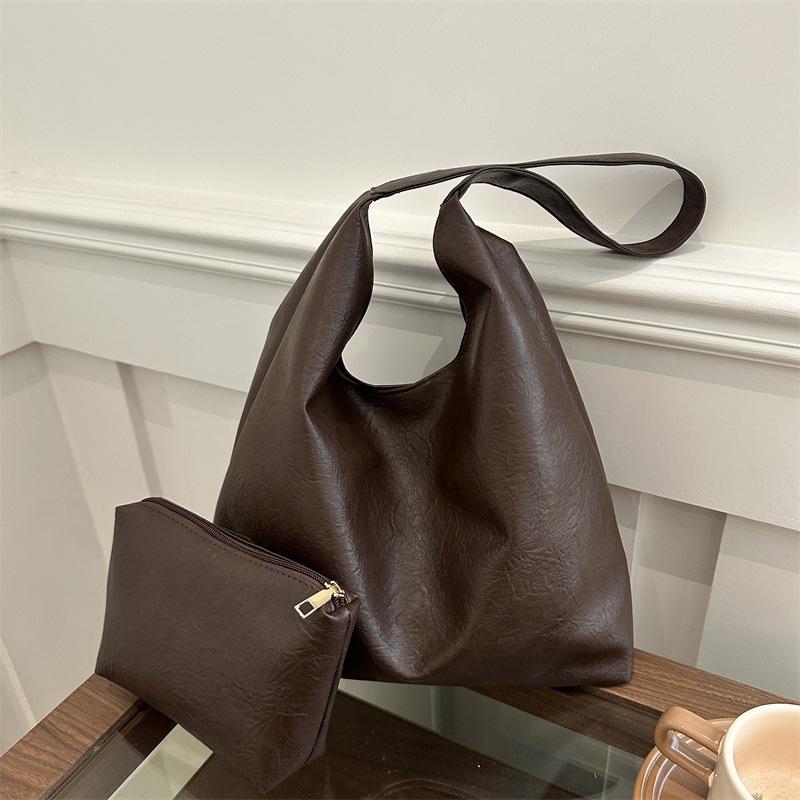 

Commuter Korean version of the new large-capacity handbag women s fashion retro child and mother bag casual versatile fashion shoulder bag