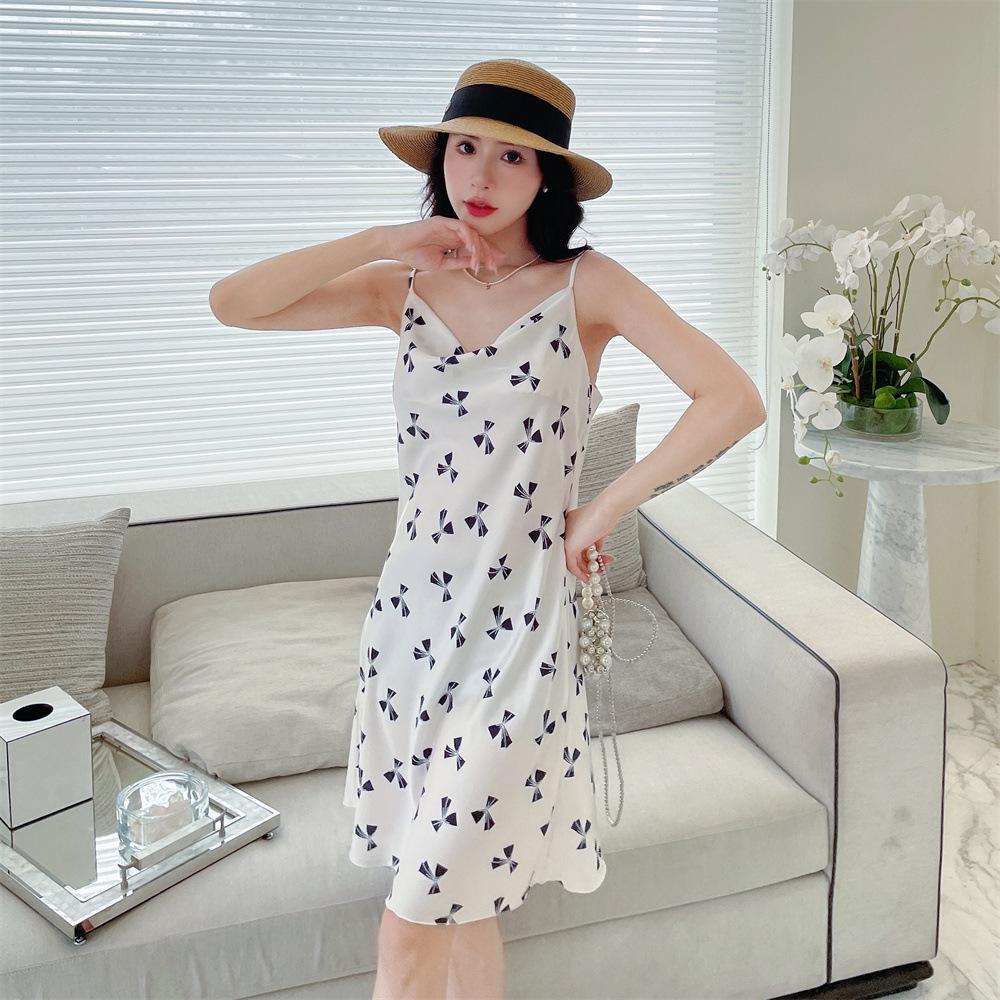 Summer new pajamas women's ice and snow silk thin suspender swing collar pure desire pajamas printed medium and long skirts