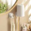 Wall Mounted Toothbrush Holder Durable Plastic No Drill Installation Space Saving Design With Cup Storage For Organized Bathroom