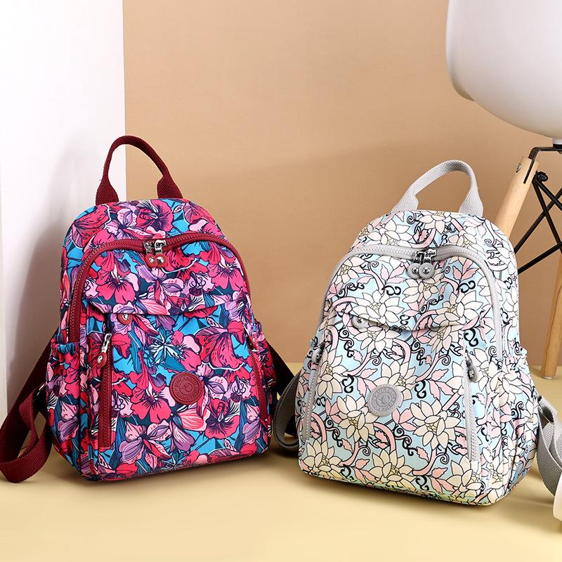 New Lightweight, Water-resistant, Large Capacity Printed Backpack for Middle-aged Mothers, Women's Outdoor Leisure Travel Bag