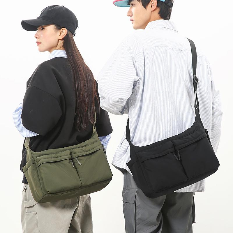 U Family Has the Same Casual Satchel, Shoulder Bag, Anti-splashing Backpack, Male and Female Students, Messenger Bag, Light Commuter Messenger Bag.