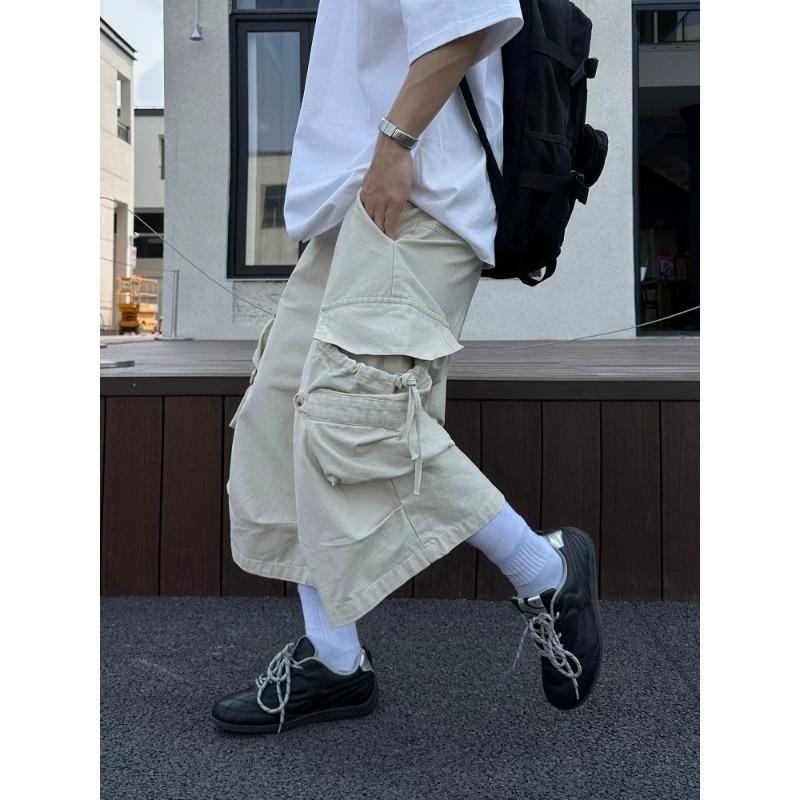 Pantalones casuales de verano finos de siete puntos retro rectos americanos multi-bolsillo de trabajo para hombre sueltos pierna ancha algodón puro no