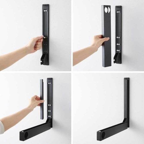 Yamazaki Tower Wall-Mounted Folding Clothes Drying Pole Holder (Set of 2), Compatible with Drywall, Includes Drywall Tweezers and Wood Screws, Black,