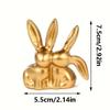 1 Stück Goldener Kuss Paar Hase Figur Einzigartige Ästhetische Harz Statue Vielseitige Innen Außen Dekoration für Zuhause Büro Regal