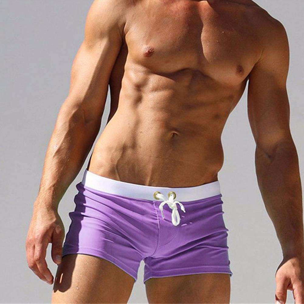 Summer men's solid-colored swimming trunks, loose men's shorts side-split zipper drawstring swimming trunks, back pockets, sports vacation beach pants