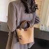 Damen PU-Leder Eimer Tasche Modisch Französisch Nische Designer Große Kapazität Vielseitig Pendler Crossbody Tasche Reise Tragetasche