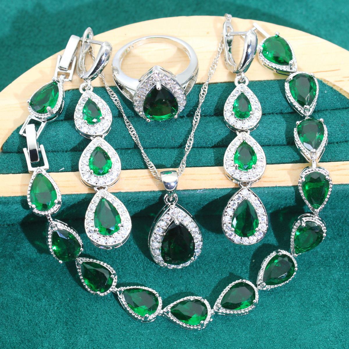 

Ювелирные изделия Цирконий Капля воды Ожерелье Серьги Кольцо Браслет Четырехсекционный комплект ювелирных изделий 10 yards